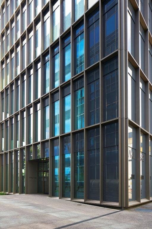 View of the building WKL-132 on the Klybeck site in Basel with an entrance door on the left