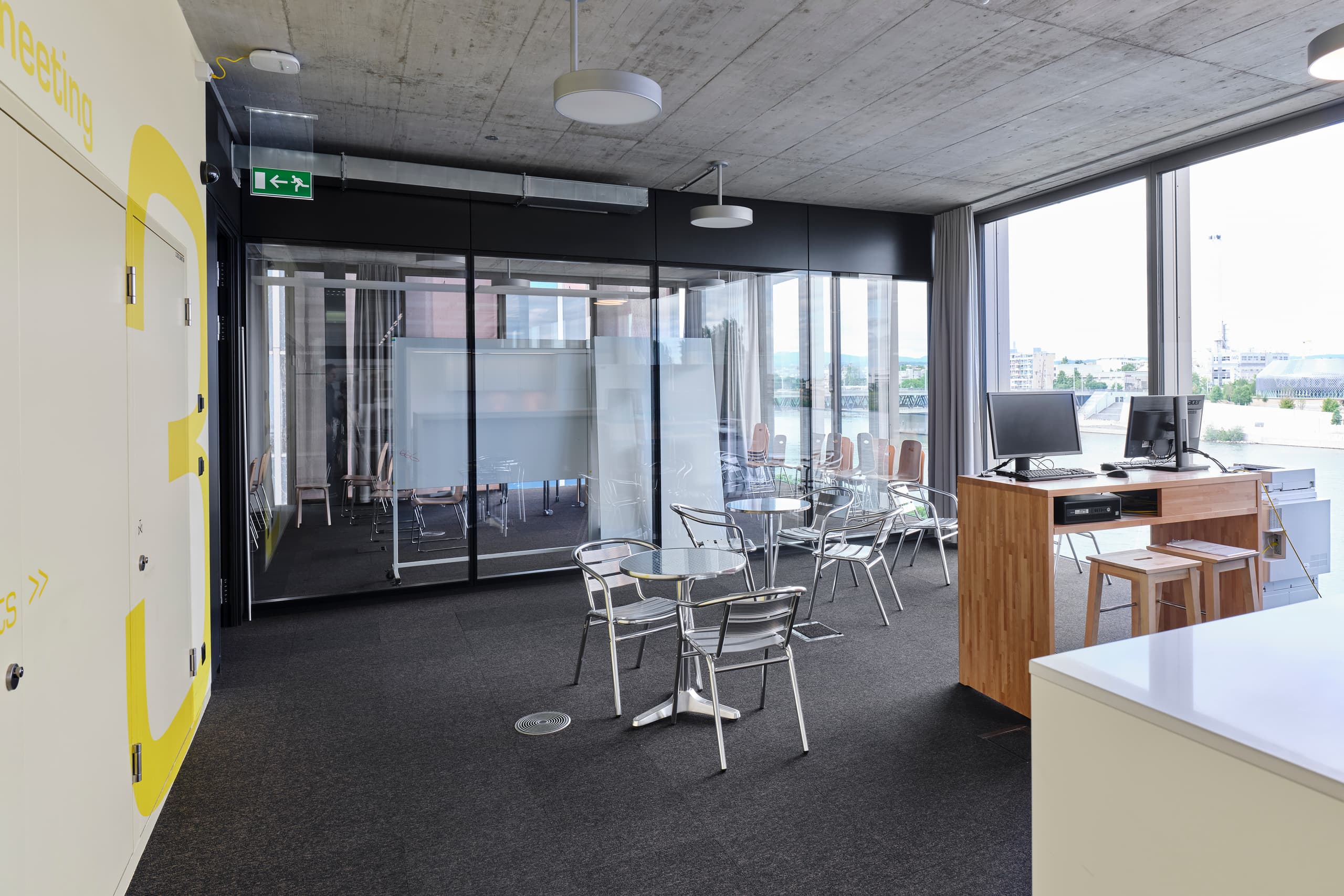 View of a meeting room in the building WKL-132 on the Klybeck site in Basel with chairs and flipcharts