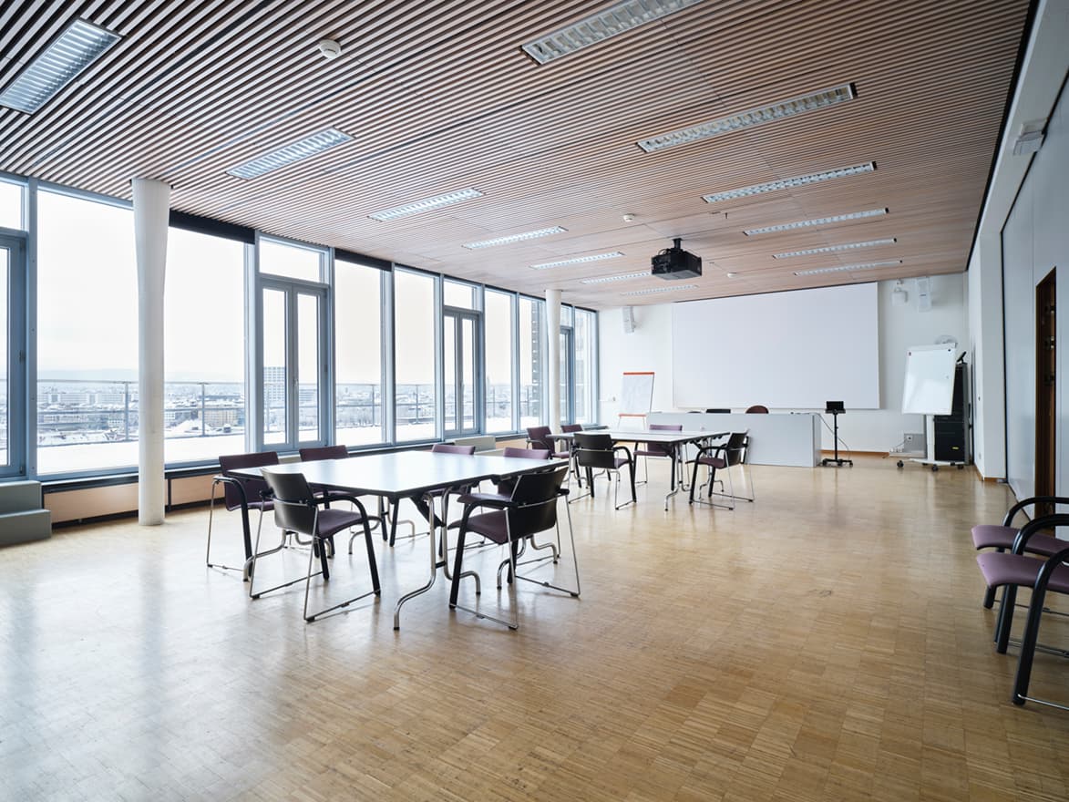 View of a large multifunctional room in the building WKL-136 in the Klybeck site in Basel with large windows